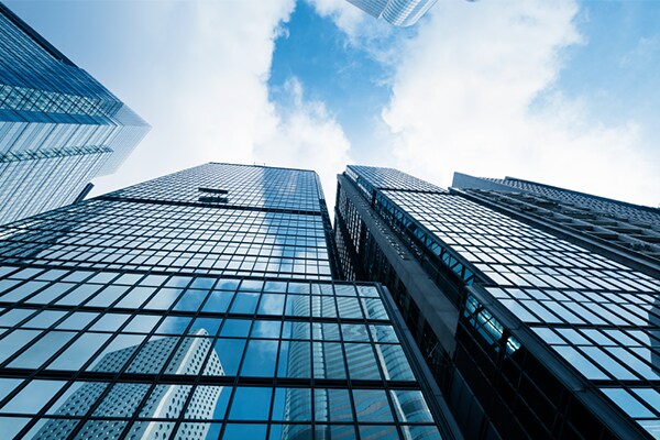 Upwards view of skyscrapers against the sky